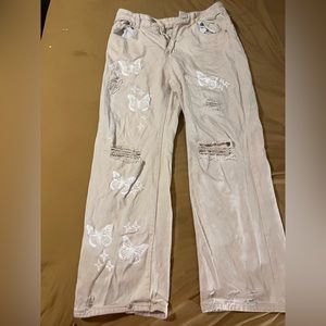 Butterfly Creme ripped jeans